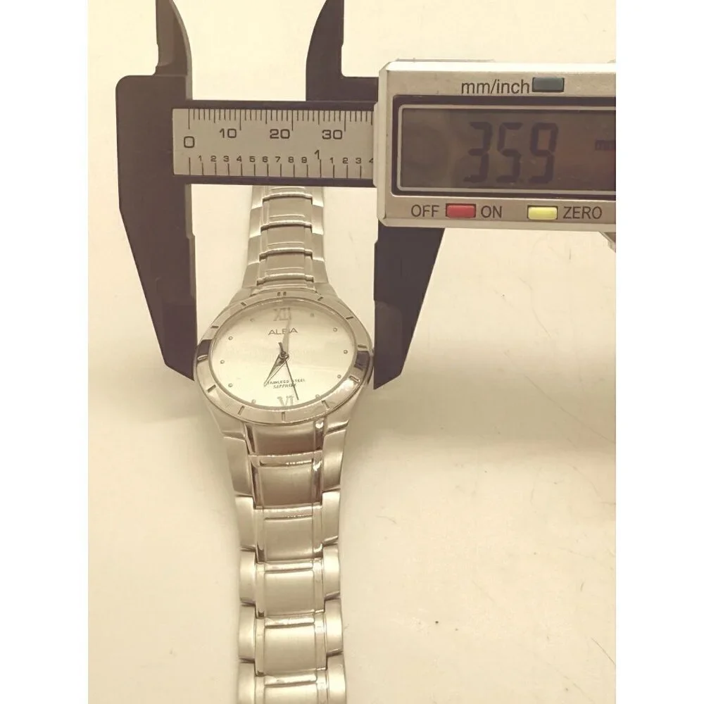 Alba Sapphire VX51-X426 Silver Tone Round Mens Watch Stainless Steel Band Roman